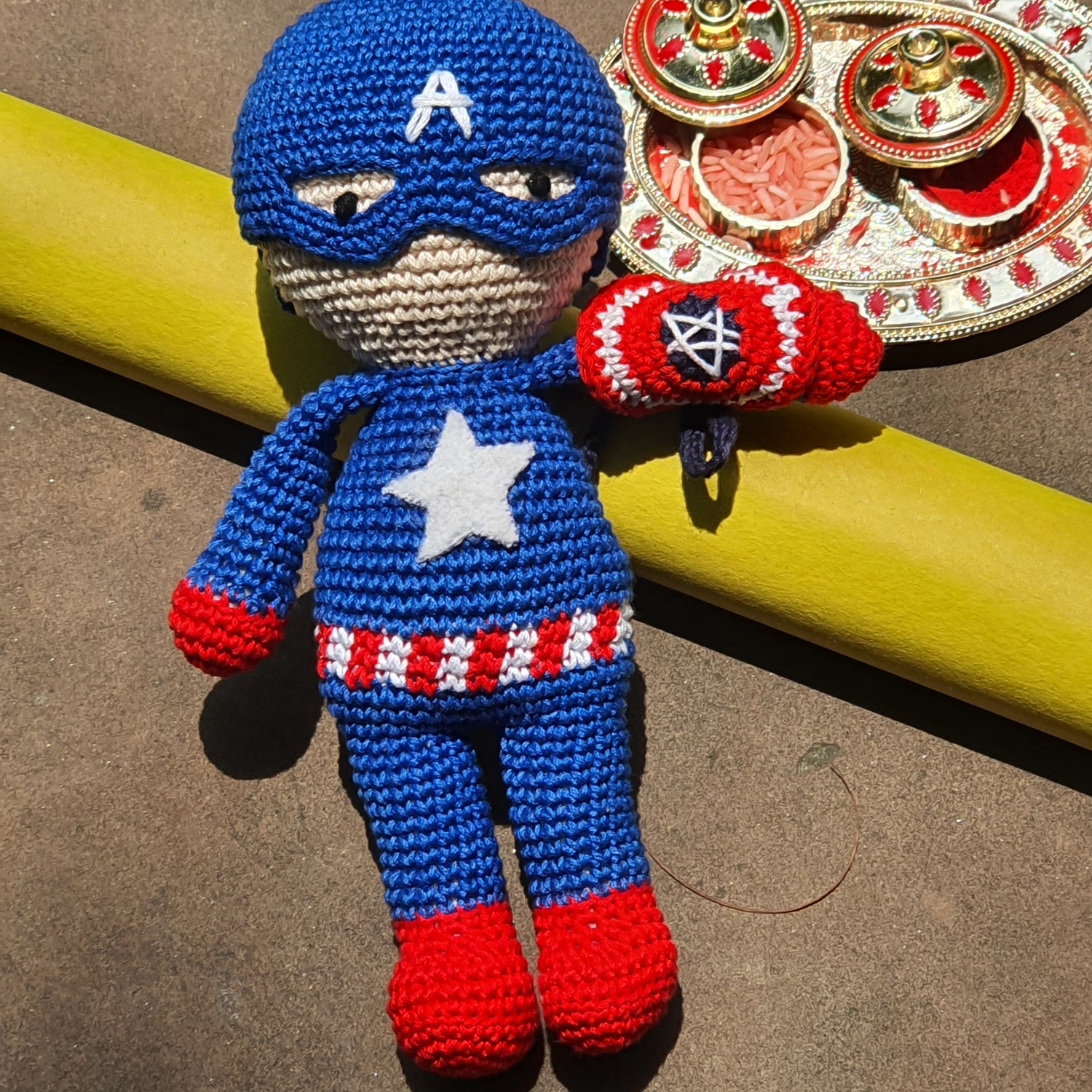 Dependable Captain America !! hand toy with a Logo Rakhi Band